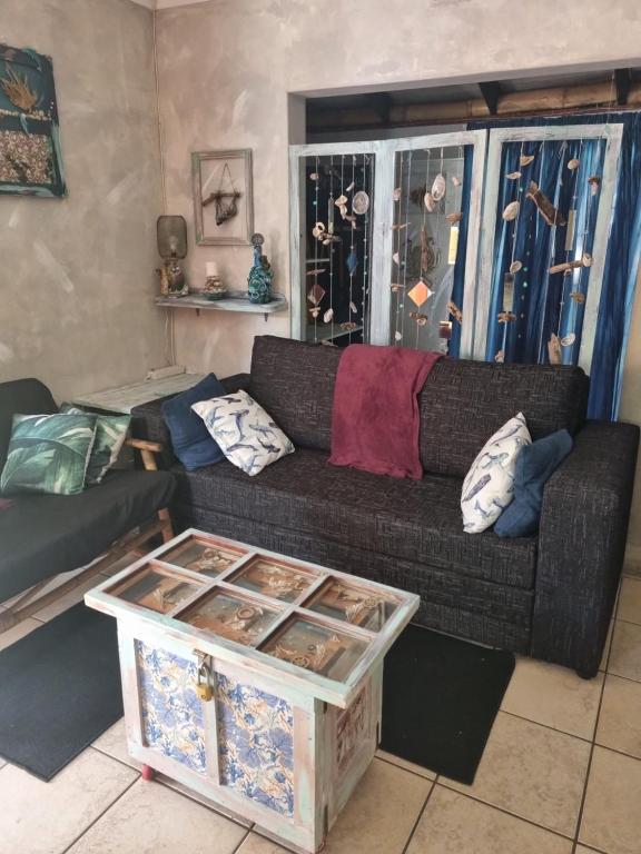 Χώρος καθιστικού στο Tweni Strandloper Cottage