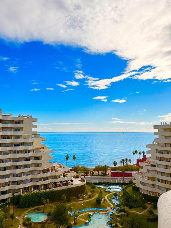 Charming Apartment in Benalbeach with Garden and Sea View
