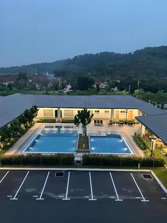 an overhead view of a pool in a parking lot at The Duta Loft in Bandar Puncak Alam