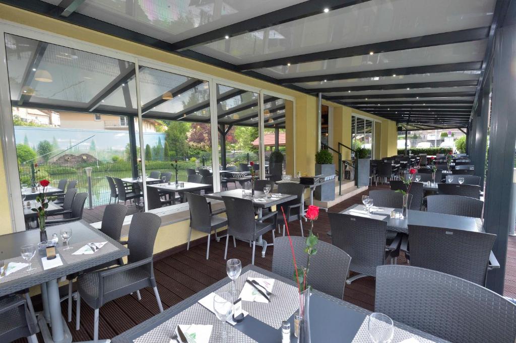 Restaurace v ubytování Hôtel Aster Restaurant Aux Arcades