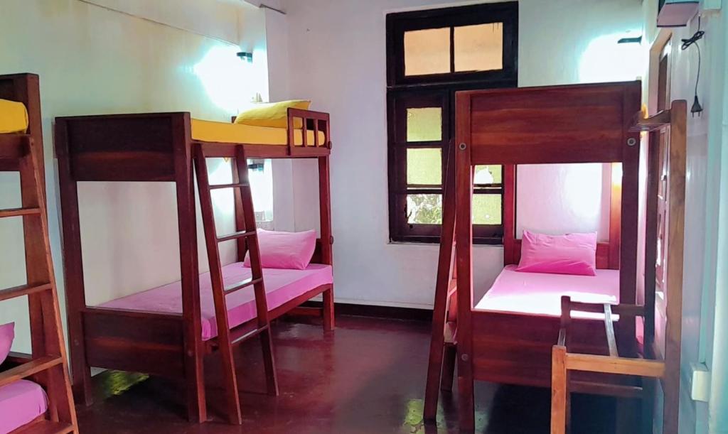 Кровать или кровати в номере Walawwa Heritage