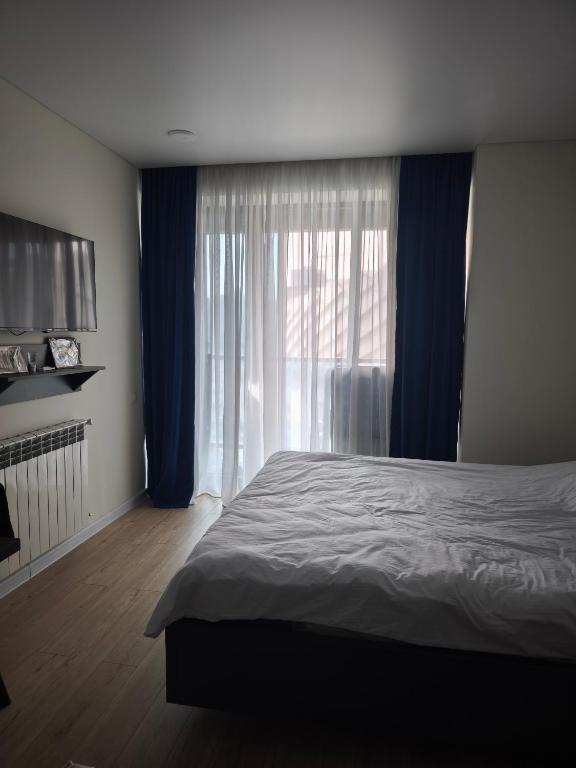 Postel nebo postele na pokoji v ubytování Walking distance to everywhere in the center of Batumi