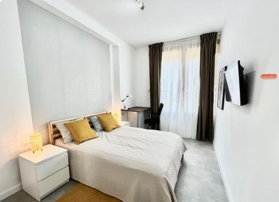 Ένα ή περισσότερα κρεβάτια σε δωμάτιο στο Celsa