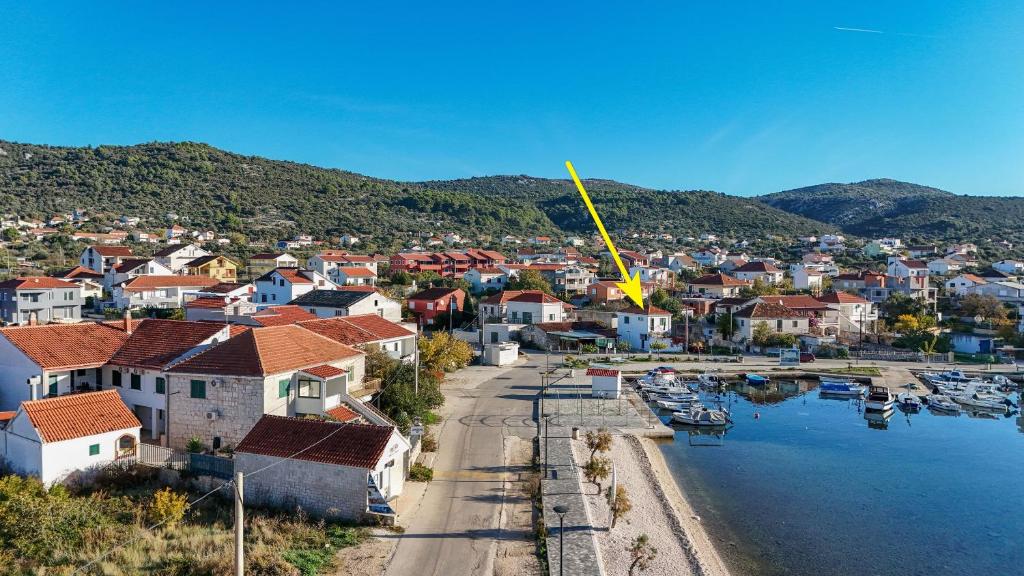 an aerial view of a small town next to a body of water at House Dinko in Vinišće