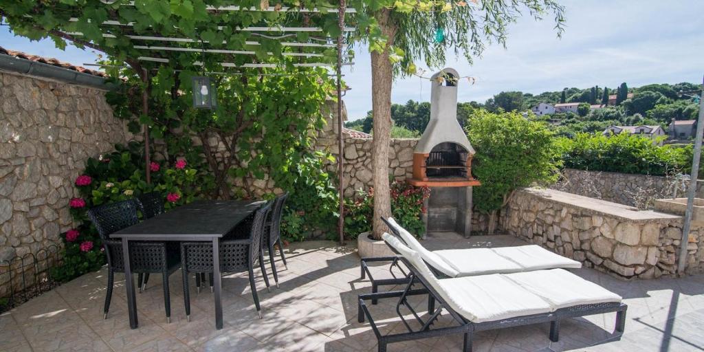 En terrasse eller udendørsområde på Marija