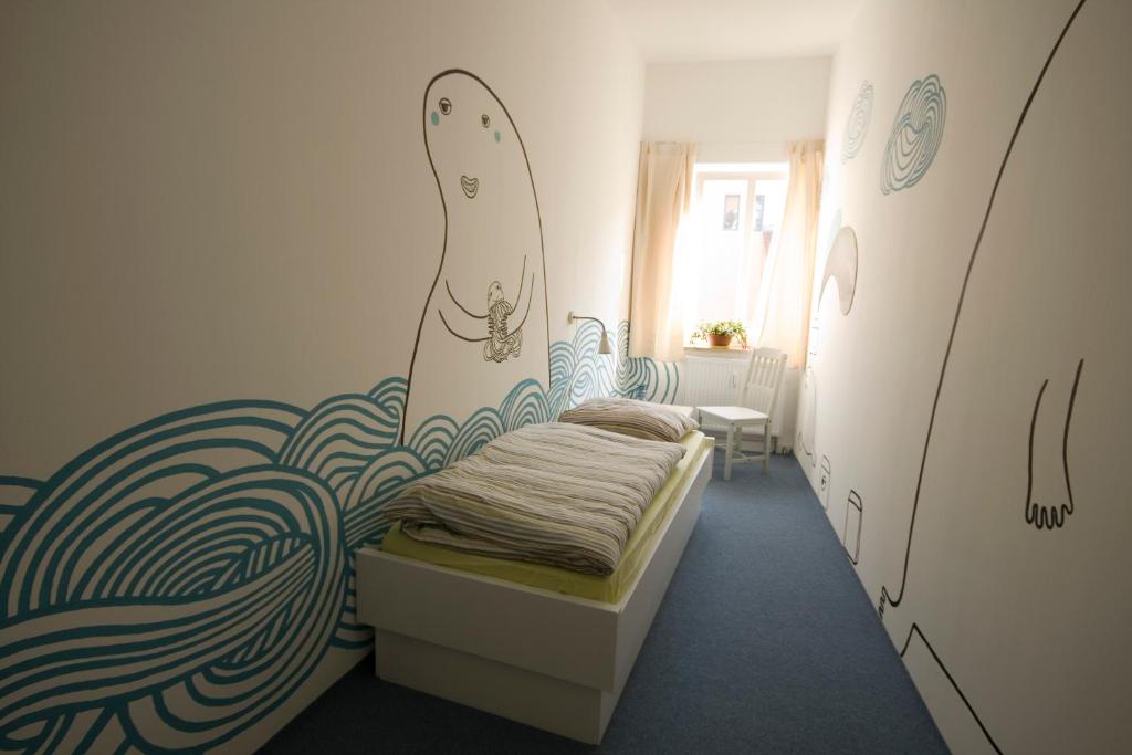 Letto o letti in una camera di Labyrinth Hostel Weimar