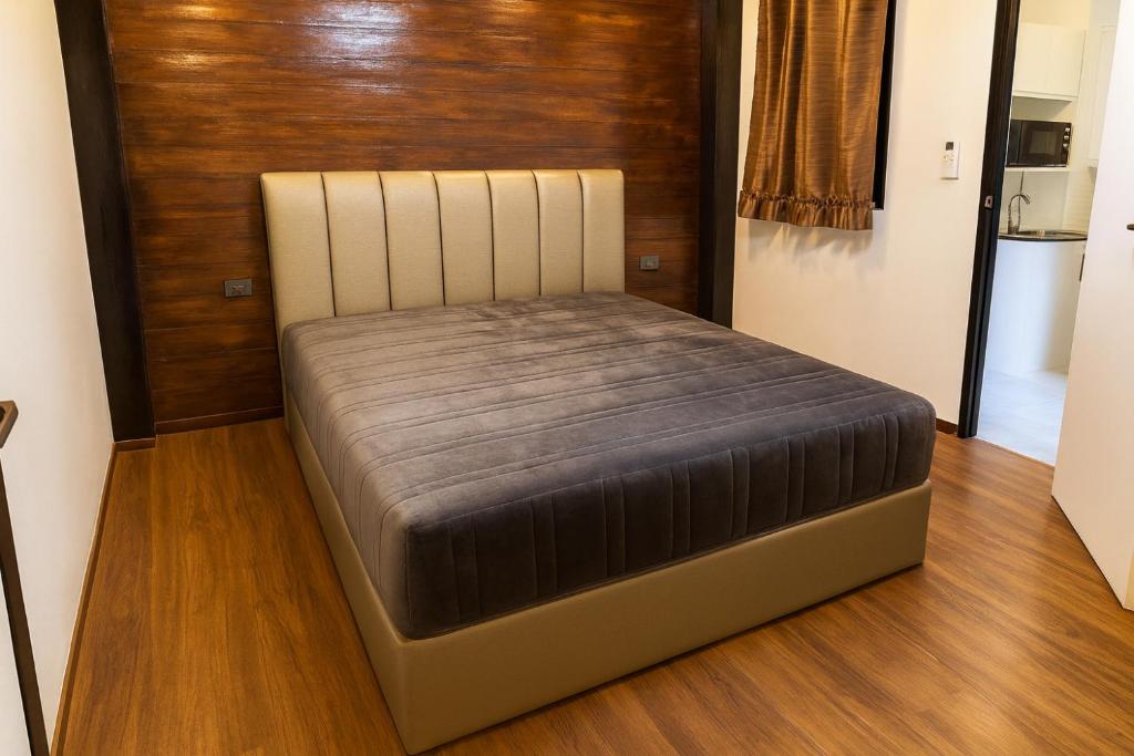 Postel nebo postele na pokoji v ubytování ANNKAMii INN