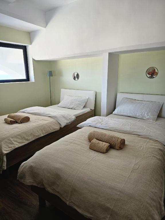 Postel nebo postele na pokoji v ubytování Soulnest Light