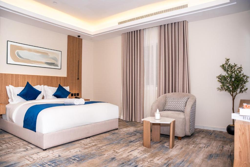 Ένα ή περισσότερα κρεβάτια σε δωμάτιο στο فندق ارجان بارك جدة