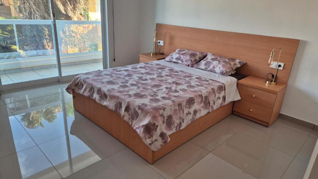 Postel nebo postele na pokoji v ubytování Santa Calmaria - Apartment in Santa Maria