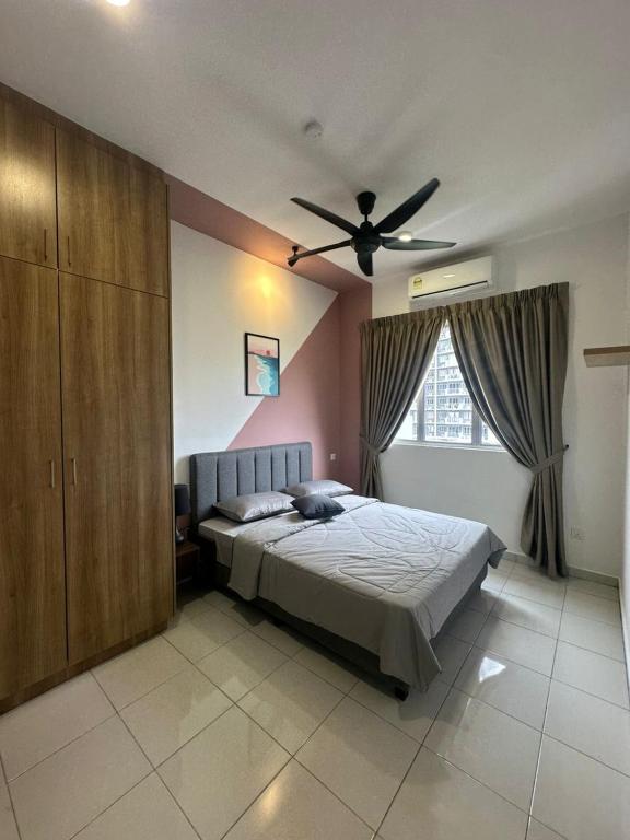 En eller flere senge i et værelse på Selesa DAAD Homestay