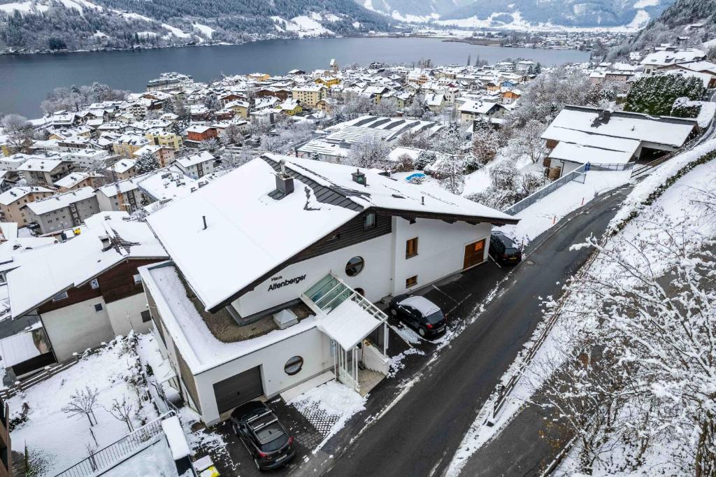 an aerial view of a town covered in snow at Haus Altenberger by we rent in Zell am See