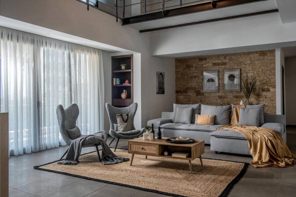 Χώρος καθιστικού στο Villa Ete Premier Luxury Villa by Prime Stay