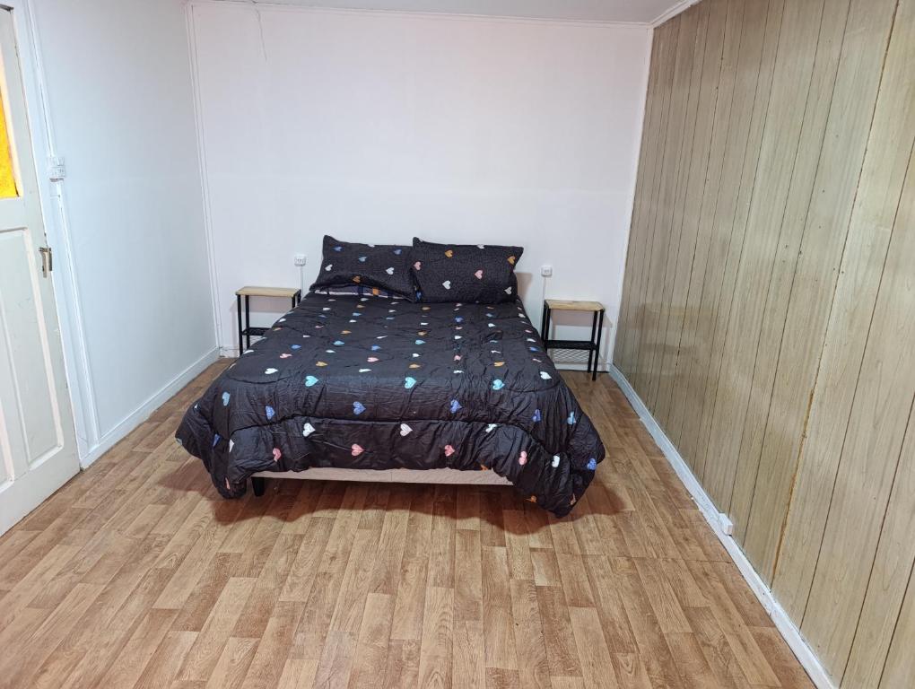 En eller flere senge i et værelse på Casa del Carmen