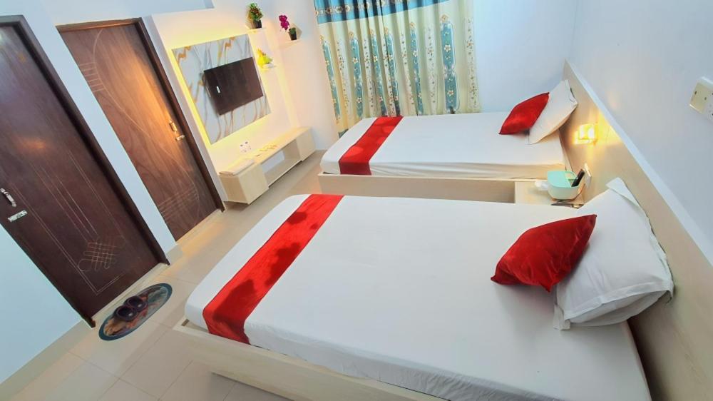 En eller flere senge i et værelse på Hotel Lynn Valley, Delux Non AC Double Bed