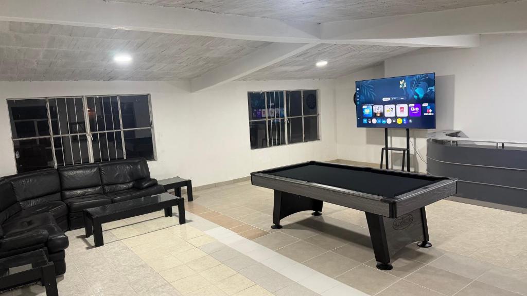 TV a/nebo společenská místnost v ubytování Casa Eva