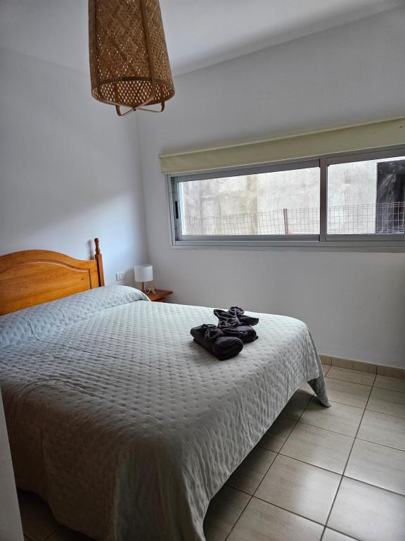 Ένα ή περισσότερα κρεβάτια σε δωμάτιο στο Jimaguas