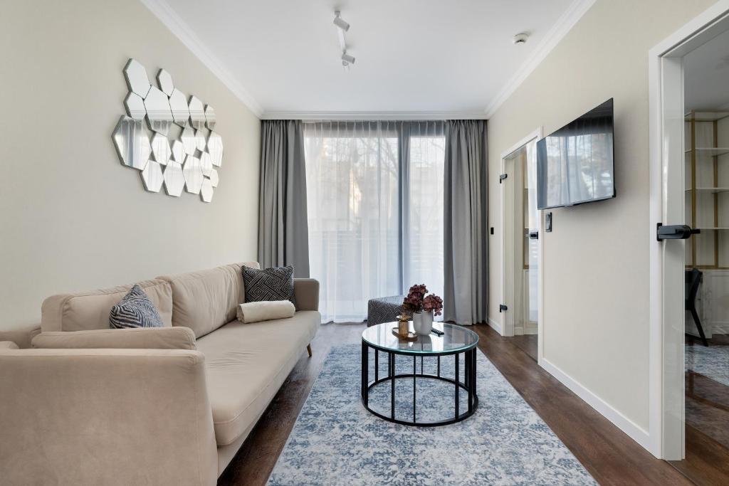 Χώρος καθιστικού στο Central Park Mielno by Solarento