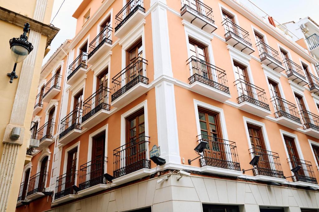 a facade of a building with balconies at Honest Granada Hotel in Granada