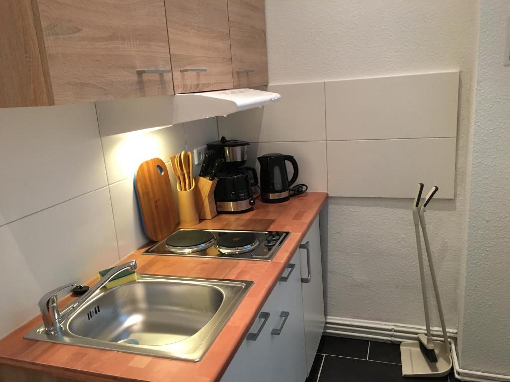 Kuchyň nebo kuchyňský kout v ubytování Hotel-Pension Adamshof
