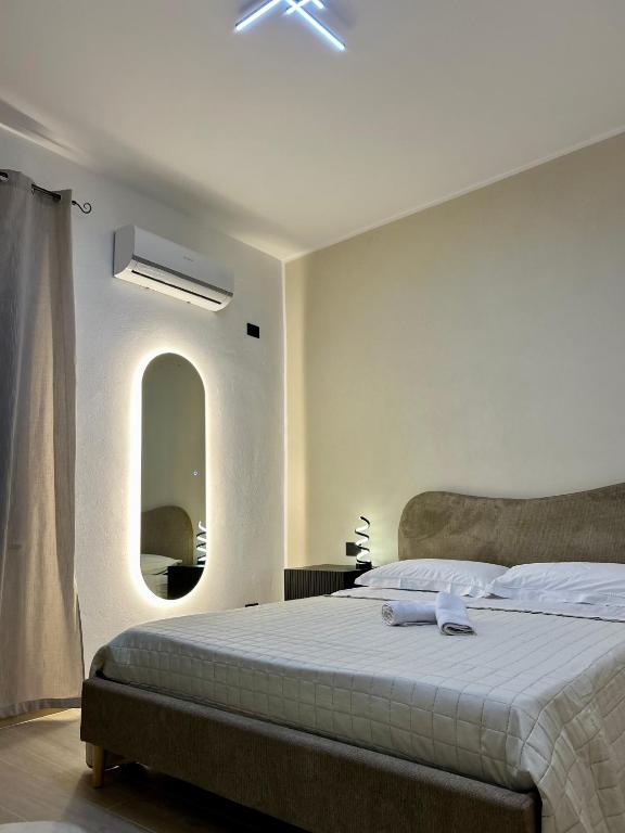 Ένα ή περισσότερα κρεβάτια σε δωμάτιο στο Pisano Suite