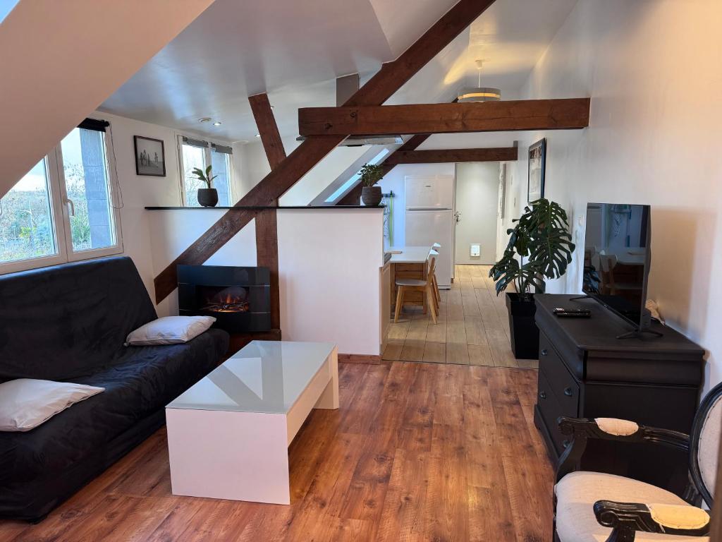 Χώρος καθιστικού στο La Mansarde