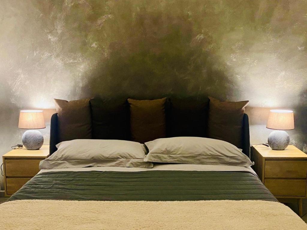 Ένα ή περισσότερα κρεβάτια σε δωμάτιο στο MM HOUSE Lainate modern design near Rho Fiera