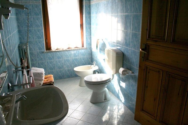 Koupelna v ubytování Hotel Beau Sejour