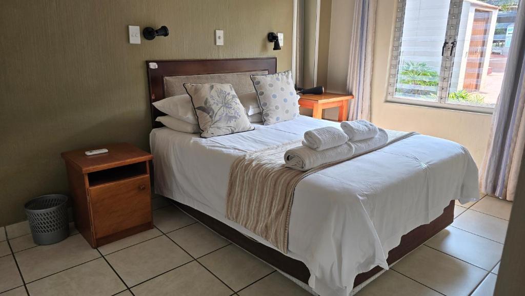 Postel nebo postele na pokoji v ubytování Chakas Rock Chalet 45