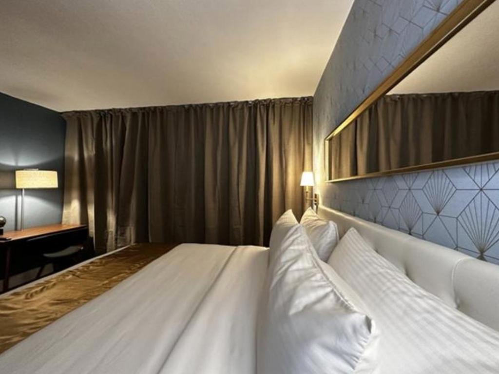 Ένα ή περισσότερα κρεβάτια σε δωμάτιο στο Hotel TB Downtown Miami