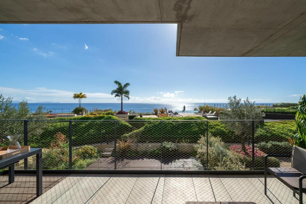 a view of the ocean from the balcony of a house at Luxury Apartment at Savoy Monumentalis by An Island Apart in Funchal