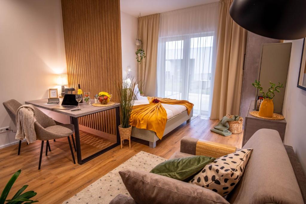 Ένα ή περισσότερα κρεβάτια σε δωμάτιο στο Between Rivers Apartments