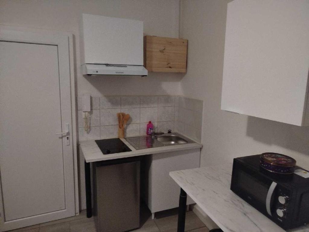 Η κουζίνα ή μικρή κουζίνα στο Cozy studio