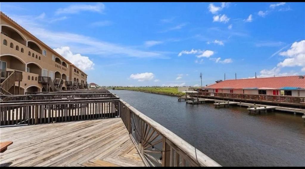 a view of a river next to a building at 14334appt101 in Corpus Christi