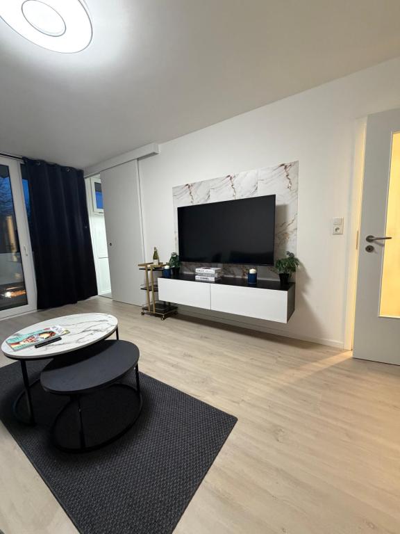 TV a/nebo společenská místnost v ubytování Munich Apartments