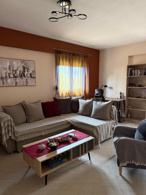 Χώρος καθιστικού στο Papi's Cozy Apartment