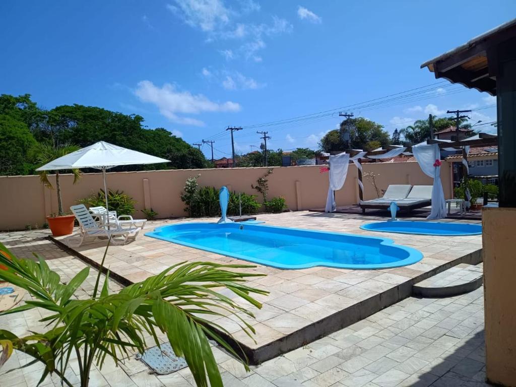 Bazén v ubytování Pousada Aruna Eco Buzios nebo v jeho okolí