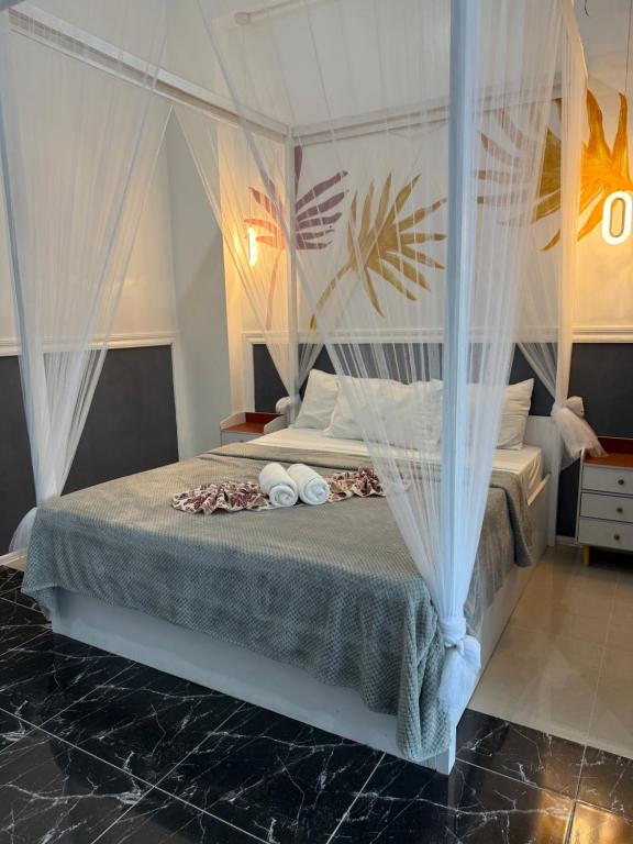 Postel nebo postele na pokoji v ubytování Dajon-6 Family Suite