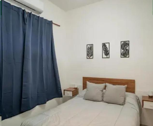 Ένα ή περισσότερα κρεβάτια σε δωμάτιο στο Hostel Suite DDT