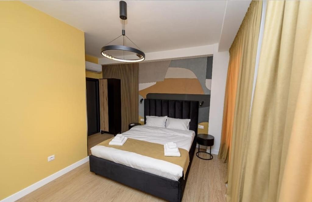 Ένα ή περισσότερα κρεβάτια σε δωμάτιο στο Luz&LukRooms