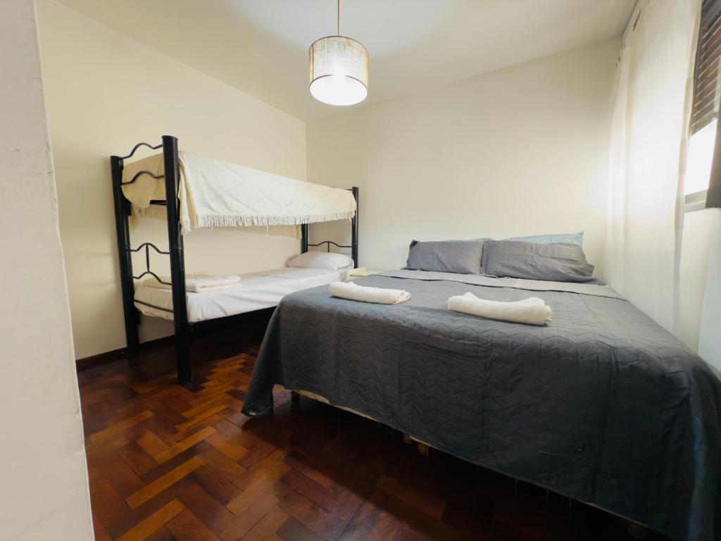 En eller flere senge i et værelse på Apartment in Nueva Córdoba