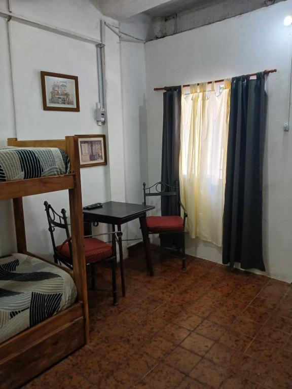 Ένα ή περισσότερα κρεβάτια σε δωμάτιο στο Pequeño Monoambiente en S Fernando