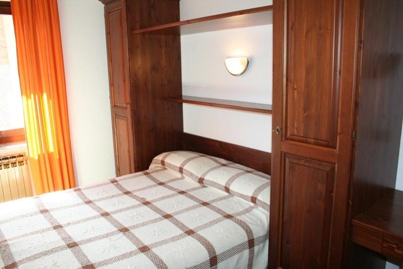 Postel nebo postele na pokoji v ubytování Hotel Beau Sejour