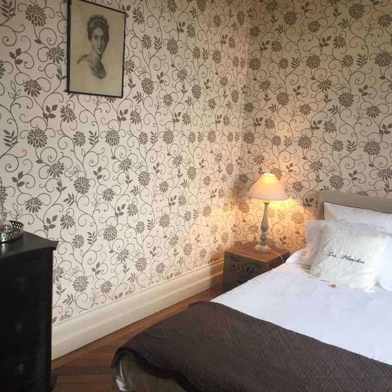 Postel nebo postele na pokoji v ubytování Le Manoir de Bénédicte B&B