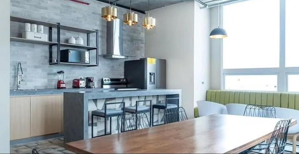 Kuchyň nebo kuchyňský kout v ubytování Apartment 319 Ecodistrito - ZonaPRO