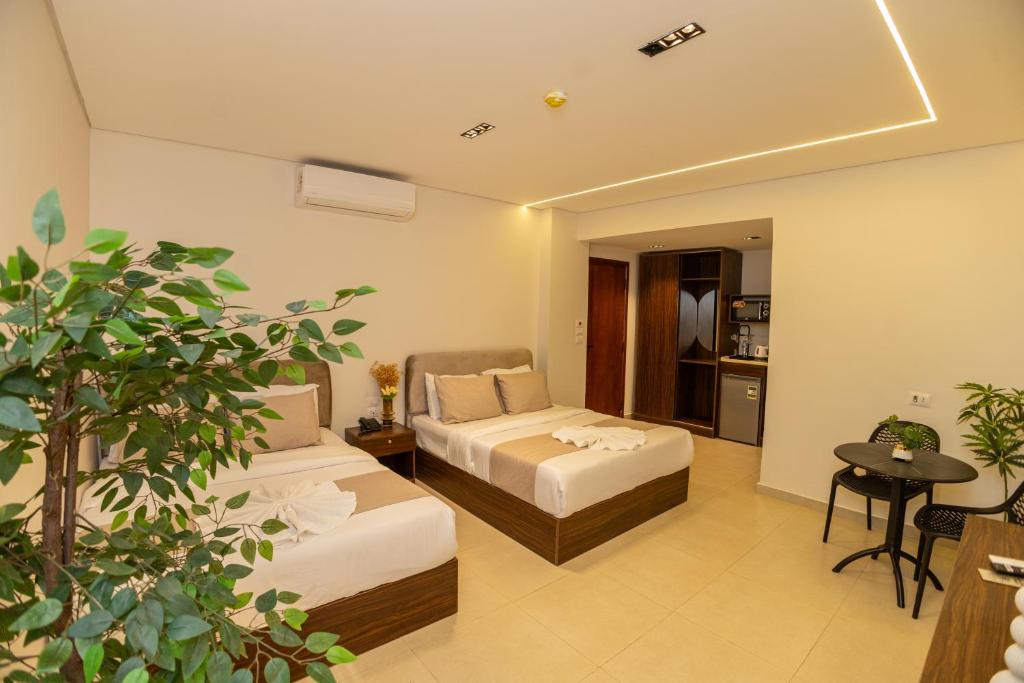 Ένα ή περισσότερα κρεβάτια σε δωμάτιο στο Imperial Residence