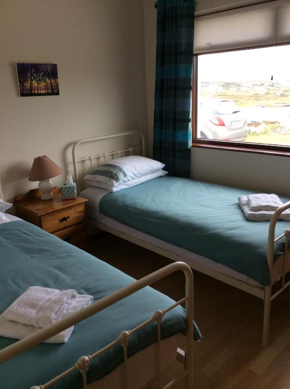 Voodi või voodid majutusasutuse Teach Donncadh B&B toas