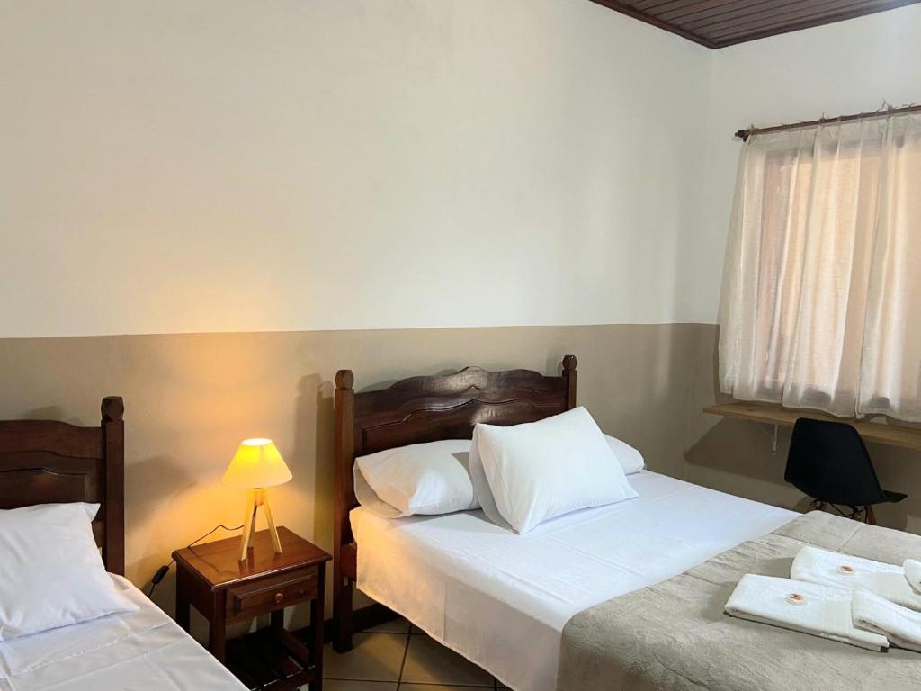 Foto dalla galleria di Suítes da Praia Paraty a Parati