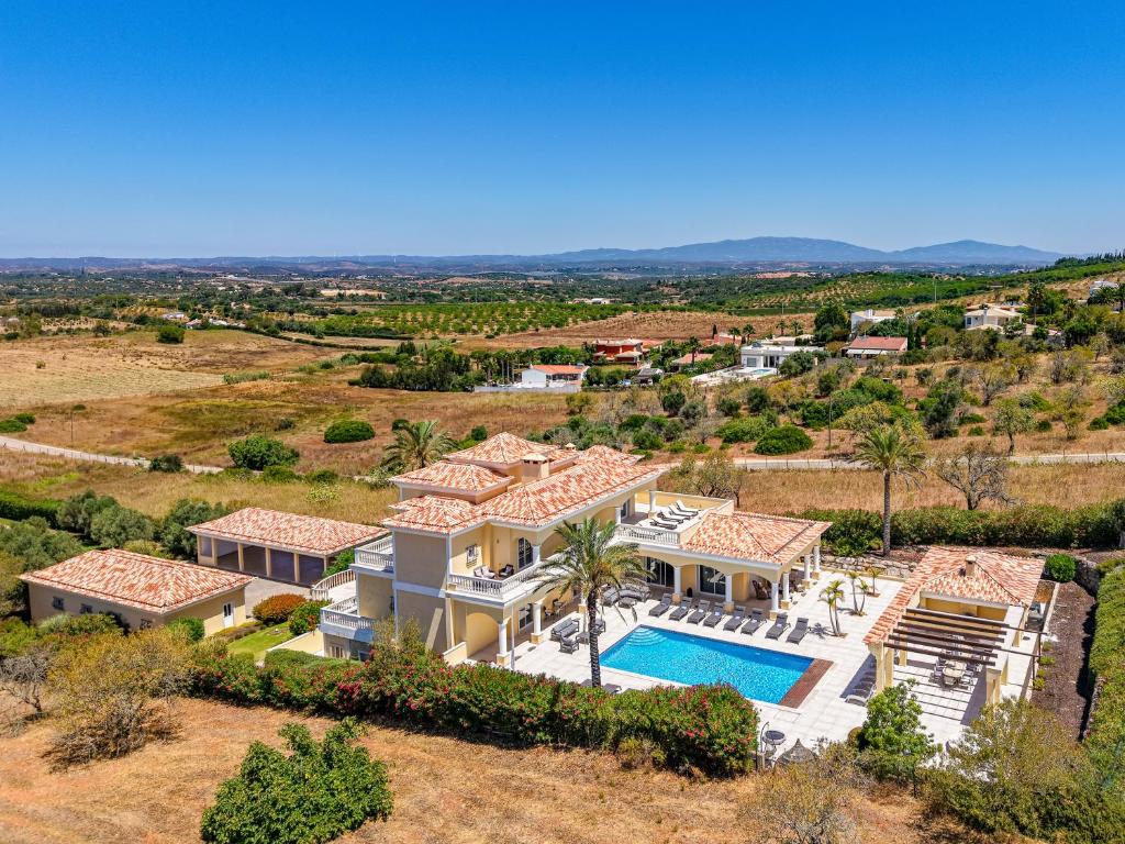 een luchtfoto van een villa met zwembad bij Casa Ferrel - Luxury 9 Bedroom Villa with Indoor & Outdoor Pools in Lagos