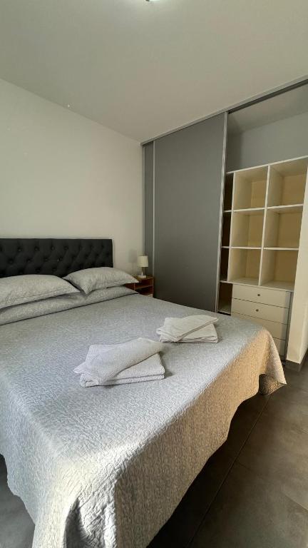 En eller flere senge i et værelse på A pocas cuadras de la playa